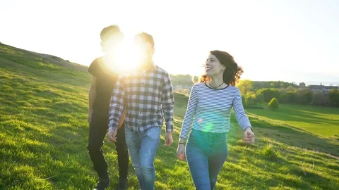 Multi Ethnic Group of Cheerful Friends Walking Together in Outdoor Nature Stock Footage 121197040