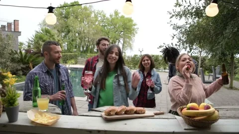 Multi ethnic group friends having fun at pool kiosk bar café dancing Stock Footage 198052810