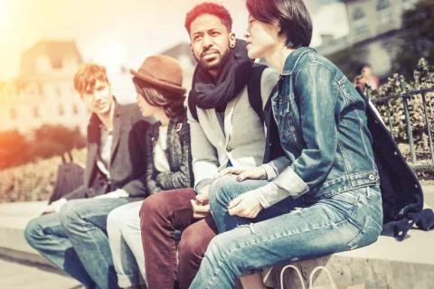 Multi-ethnic Group Of Friends Having Fun In Paris, Notre Dame Foto stock