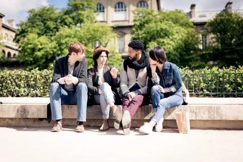Multi-ethnic Group Of Friends Having Fun In Paris, Notre Dame Foto stock