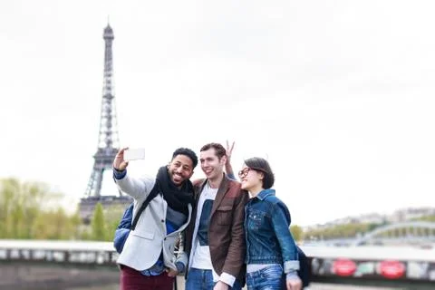 Multi-ethnic Group Of Friends Having Fun In Paris Along Seine 스톡 사진