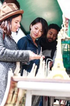 Multi-ethnic Group Of Friends Having Fun In Paris, Notre Dame Stock Photos
