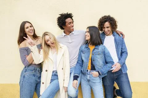 Multi-ethnic group of friends posing while having fun and laughing together Fotos de archivo