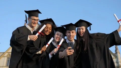 Multi ethnic group of graduated students taking selfie. Stock Footage 118042856