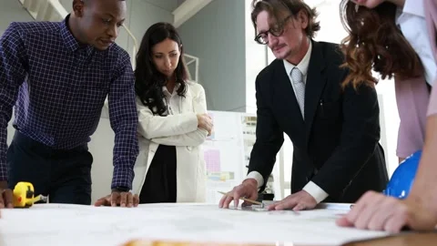 Multi ethnic group group engineering with technical leader or manager working  Stock Footage 164642737