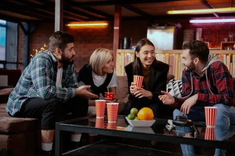 Multi ethnic group of office worker while have a lunch time they have a Stock Photos