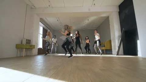 Multi-Ethnic Group of People Dancing in Studio Stock Footage 104039539