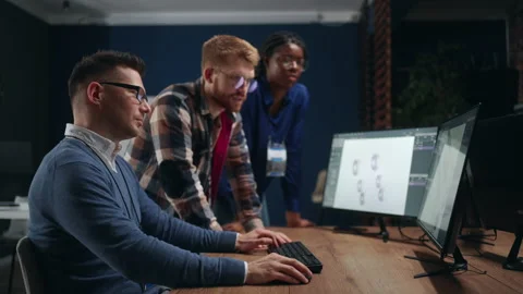 Multi ethnic group of people work in office, use 3D modeling technology, looking Stock Footage 231352535