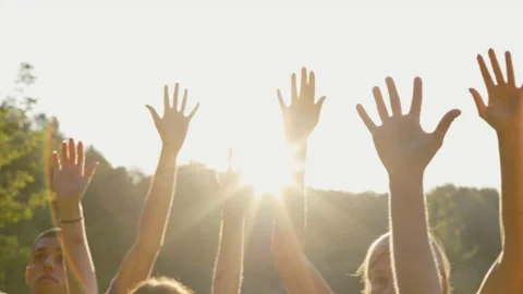 Multi Ethnic Group Raising Hands to the Sky. Close Up Volunteers Hands of Stock Footage 234453369