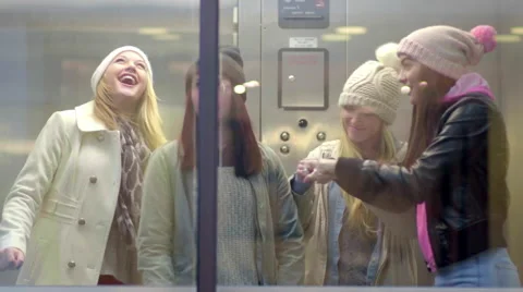 Multi-Ethnic Group Of Teens Dance In A Glass Elevator Stock Footage 46823990