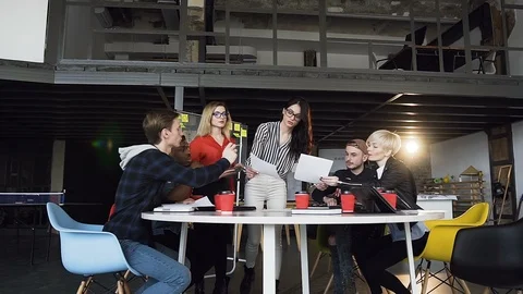 Multi ethnic group of young hipster people discussing business ideas. Stock Footage 108321289