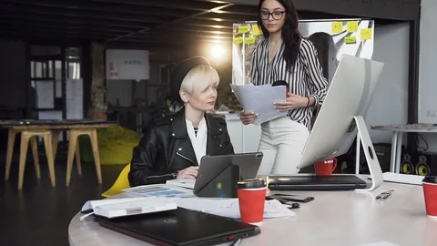 Multi ethnic group of young hipster peole working in the office. Stock Footage 108345383