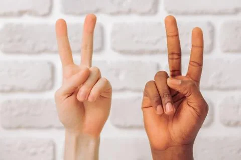 Multi ethnic hands Stock Photos