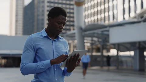 Multi-Ethnic Manager Texting with Clients Near the Business Centre. Stock Footage 265831291