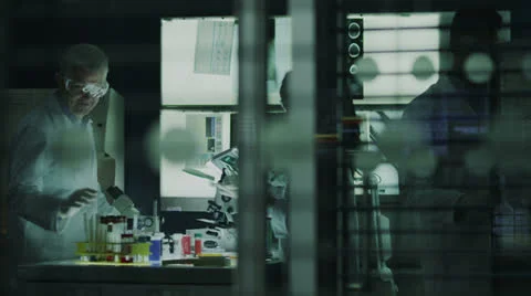 Multi ethnic scientific research team working in the lab Stock Footage 24851153