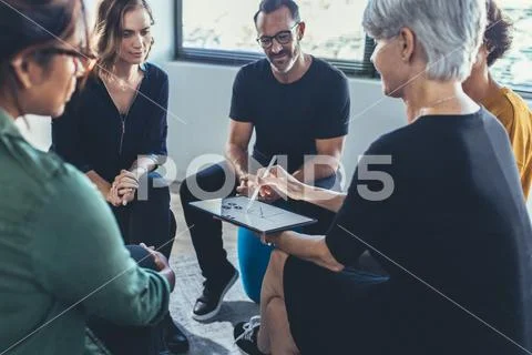 Multi-ethnic staff having a group discussion Stock Photos