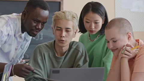 Multi-Ethnic Students Having Discussion on Computer Science Course Stock Footage 257060168