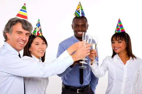 Multi ethnic team toasting Stock Photos