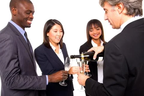 Multi ethnic team toasting Stock Photos