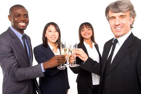 Multi ethnic team toasting Stock Photos