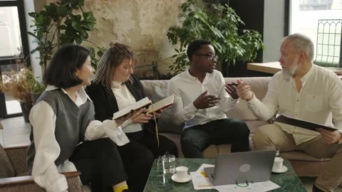 Multi ethnic team working on new business project with idea at creative business Video stock 166058804