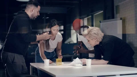 Multi-ethnic team of young creative people have a vigorous business discussion Stock Footage 140798796