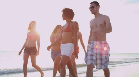 Multi Ethnic Teens Walking Beach Together Stock Footage