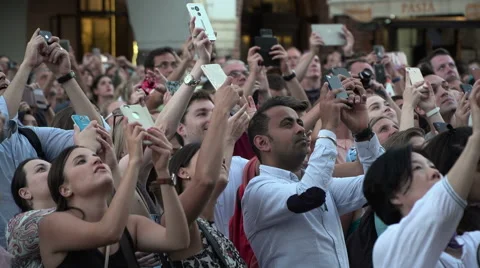 Multi Ethnic Tourists Crowd take Pictures with their Mobile's Stock Footage 67707565