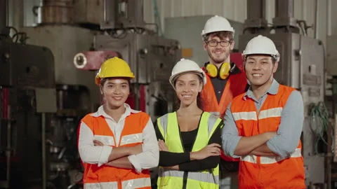 Multi-ethnic workers in the factory smiling confidently, Smart Team Stock Footage 146938622