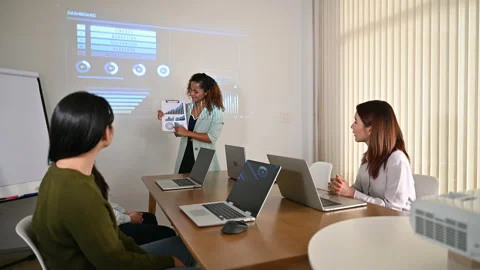 Multi-ethnicity business persons brainstorming ideas in meeting room Stock Footage 154875209