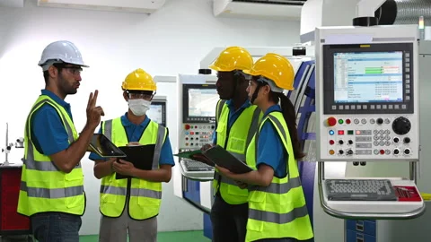 Multi ethnicity engineer and workers working in line up Stock Footage 153299119