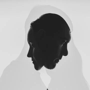 Multi exposure black and white silhouettes of portraits men and women on whit Stock Photos