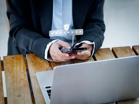 Multi factor authentication concept. Virtual safety shield icon while access  Stock Photos