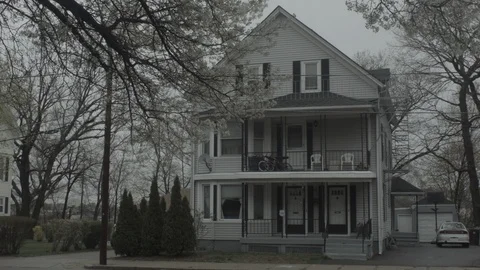Multi family duplex home with trees in bloom Stock Footage 90396011