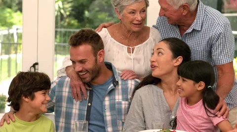 Multi generation family having lunch Stock Footage 60401042
