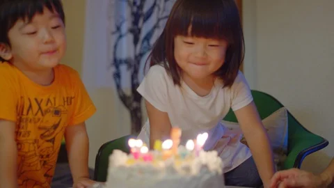 Multi-generation family serving and eating food at home. Stock Footage 100831106
