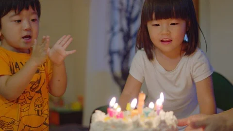Multi-generation family serving and eating food at home. Stock Footage 100831701