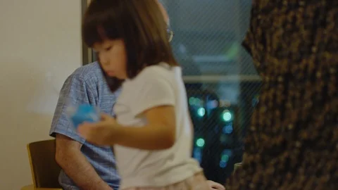 Multi-generation family serving and eating food at home. Stock Footage 100842382