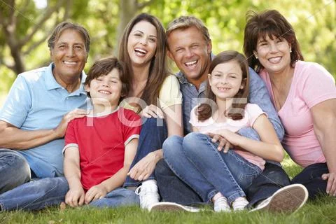 Multi generation Hispanic family in park Stock Photos