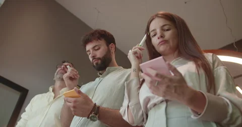 Multi generational, business team collaborating in modern office. They are Stock Footage 270089420