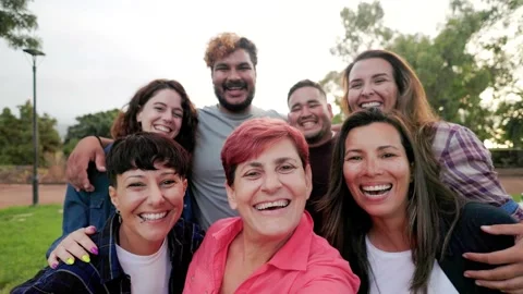 Multi generational people taking selfie outside - Happy group of friends fun Video stock 246294266