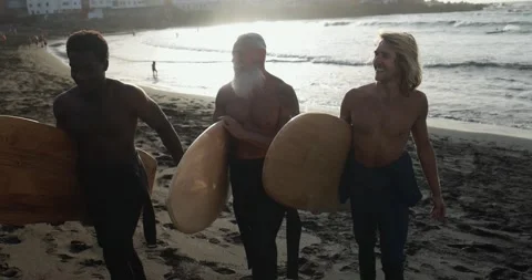 Multi generational surfer men on the beach Stock Footage 151685148