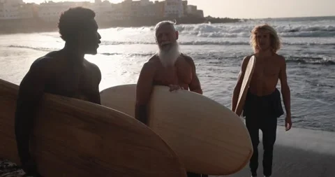 Multi generational surfer men on the beach 動画素材 151685441