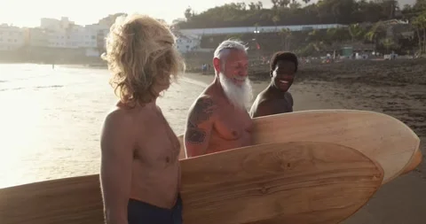 Multi generational surfer men on the beach Stock Footage 151685481
