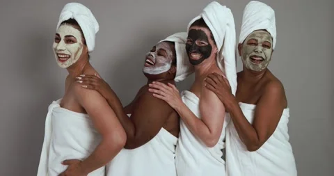 Multi generational women having fun wearing facial beauty mask Vídeos de archivo 157005214