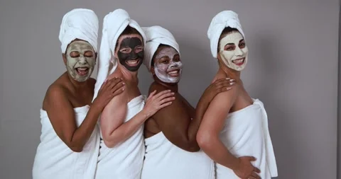 Multi generational women having fun wearing facial beauty mask 動画素材 157005215