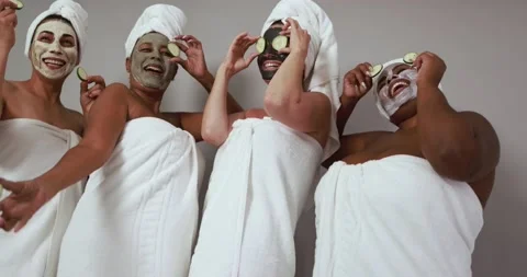 Multi generational women having fun wearing facial beauty mask Stock Footage 157005252