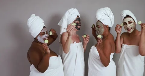 Multi generational women having fun wearing facial beauty mask Vídeo Stock 157005282