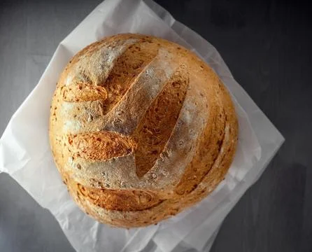 Multi grain bread on a wooden table. Stock Photos