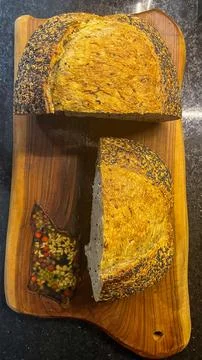 Multi-grain wholemeal bread cut in half Stock Photos